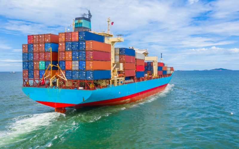 container-ship-leaving-industrial-port